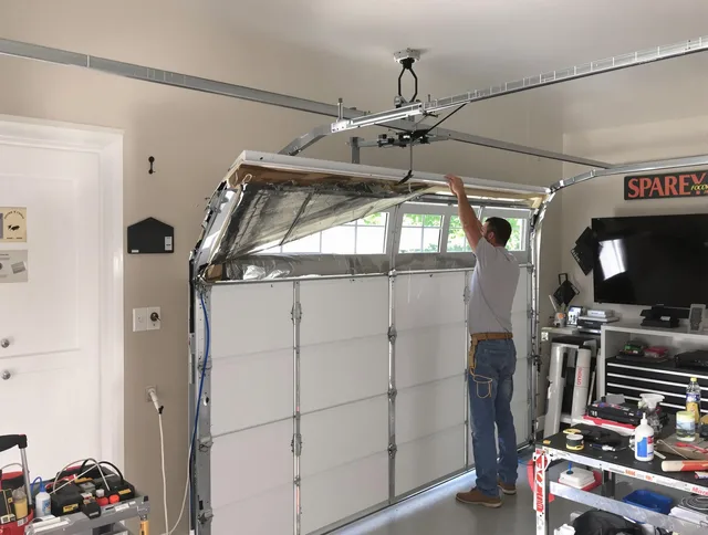 Garage door section replacement by West Palm Beach Garage Door Repair in West Palm Beach