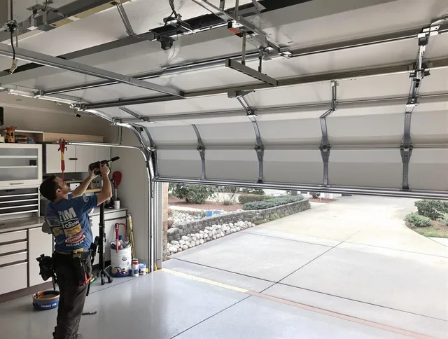 Garage door track repair service by West Palm Beach Garage Door Repair in West Palm Beach